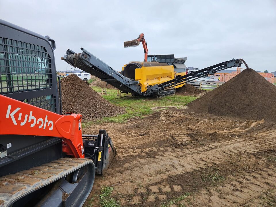 Screened topsoil produced by large tracked trommel